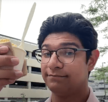 亚伦里维拉 holding up ice cream dish 